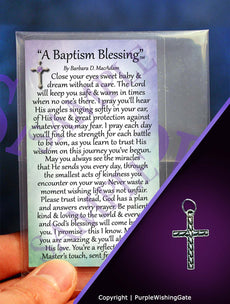 Baptism blessing card with a boy's small cross pendant charm on a purple background
