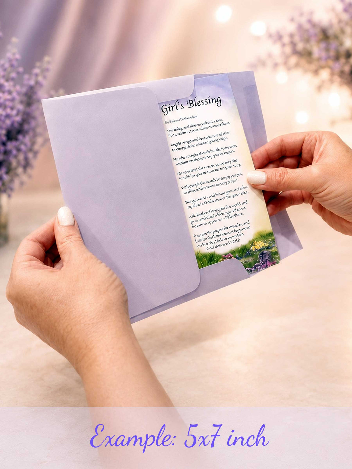 Example of a 5x7 Purple Wishing Gate blessing card held in hand while being pulled from a lavender gift envelope to show real-life size and presentation.