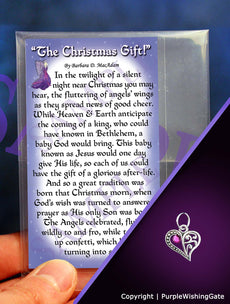 A poem titled 'The Christmas Gift' shown on a wallet-size card, and a crescent-shaped heart charm with a fuchsia crystal against a purple background.