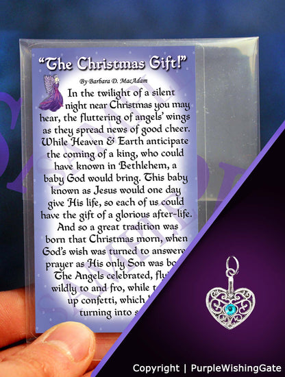 A poem titled 'The Christmas Gift' shown on a wallet-size card, and a heart-shaped charm with a Caribbean blue crystal against a purple background.