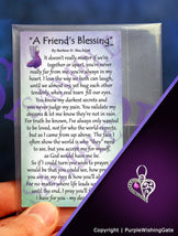 Wallet-size card with a poem titled 'A Friend's Blessing,' and a crescent-shaped heart charm with a fuchsia crystal against a purple background.
