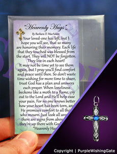 Wallet-size sympathy poem called 'Heavenly Hugs,' plus a heritage cross charm with a royal blue crystal against a purple background.