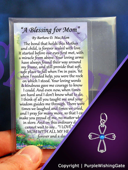 Small poem card titled 'A Blessing for Mom,'  plus an angel-like cross with a royal blue crystal against a purple background.