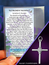 Retirement blessing card and a masculine rope cross pendant on a purple background.